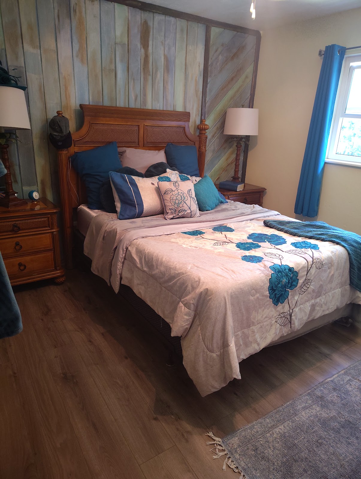 Bedroom with a wood accent wall